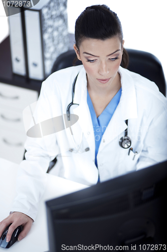 Image of Top angle of the young doctor at her room