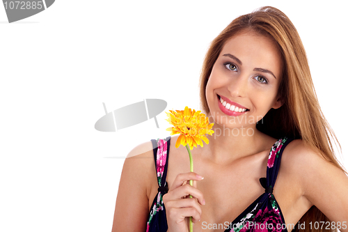 Image of Beautiful smiling girl holding sun flower