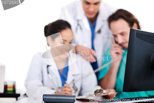 Image of Doctor team making discussion over phone
