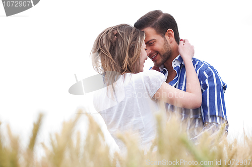 Image of Loving couple under the clear sky