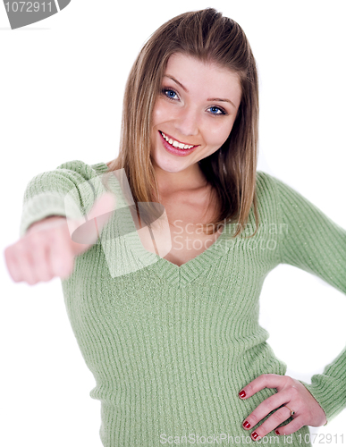 Image of Smiling beautiful girl showing her thumps up