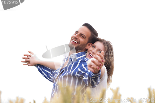Image of Couple enjoying the breeze in the park