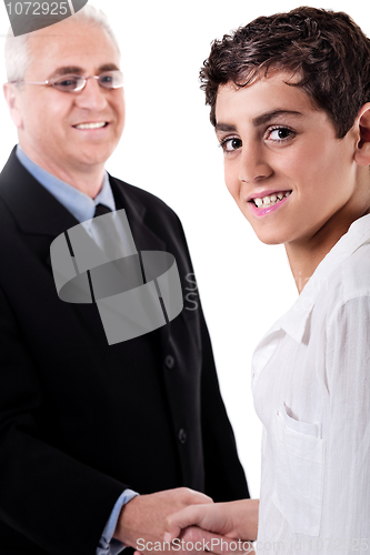 Image of Business man handshake with a young boy