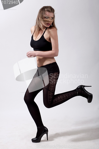 Image of Sexy young model running