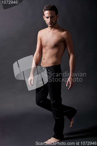 Image of Fashion male model with black jean