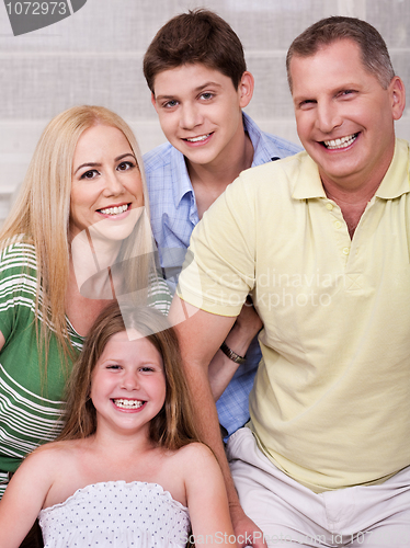 Image of Portrait of happy family of four