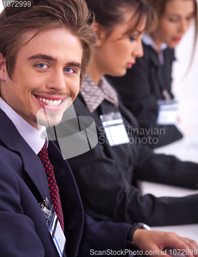 Image of Closeup of attractive business men with colleague