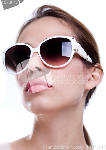 Image of Attrractive woman with sunglasses