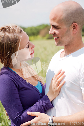 Image of Beautiful couple in love looking at each other