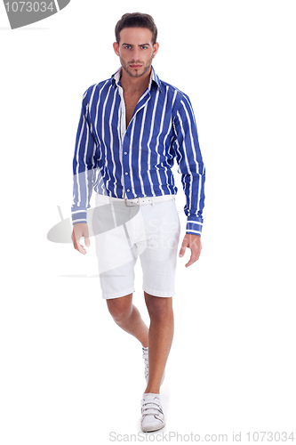 Image of Young guy in  casual wear ready to walk