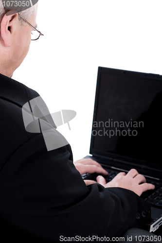 Image of Rear view of business man working in laptop