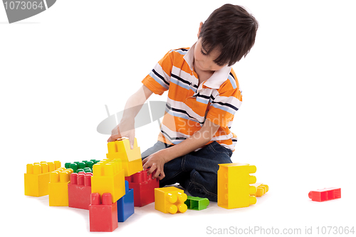 Image of Smart boy playing with blocks