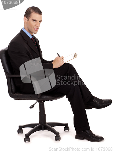 Image of professional business men taking notes