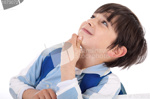 Image of Cute kid thinking and looking up