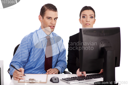 Image of Business women pointing something on their computer