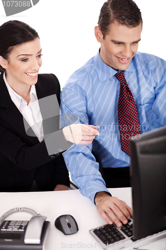 Image of Business women pointing something on their computer