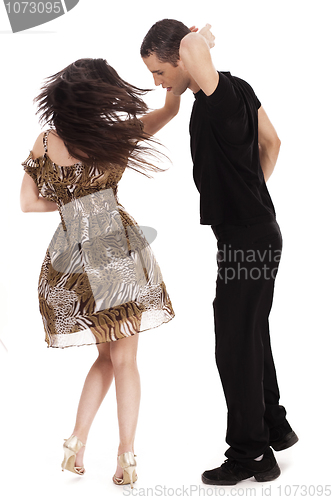 Image of young Couple dancers in joyfull mood