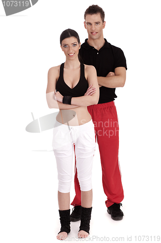 Image of Fitness couple posing to camera