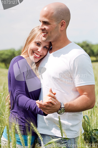 Image of Attractive couple embracing