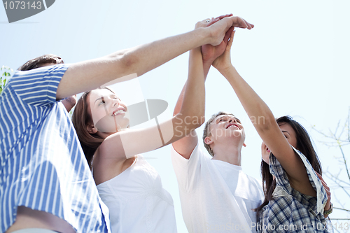 Image of Hands of young men and women