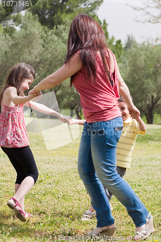 Image of Family playing in the park