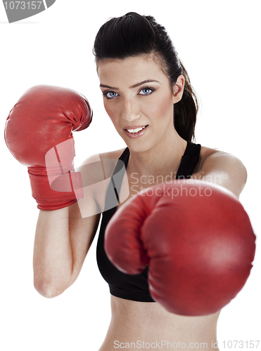 Image of Woman boxer giving a punch