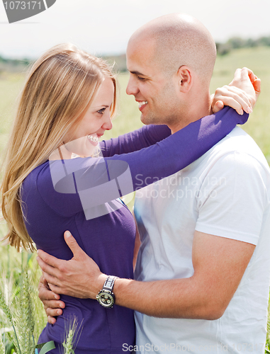 Image of Men and woman hugging