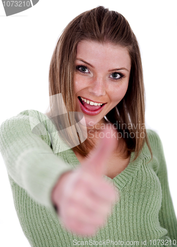 Image of Smiling beautiful girl showing her thumps up
