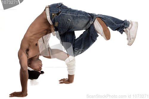 Image of Dancer balancing his knees with his elbows