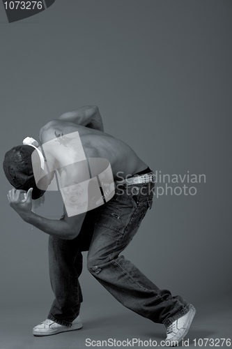 Image of Young teenager performing dance movements