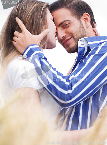 Image of Loving couple, Man looking at camera