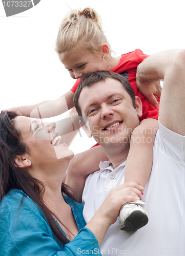 Image of Portrait of cheerful couple with their daughter having fun