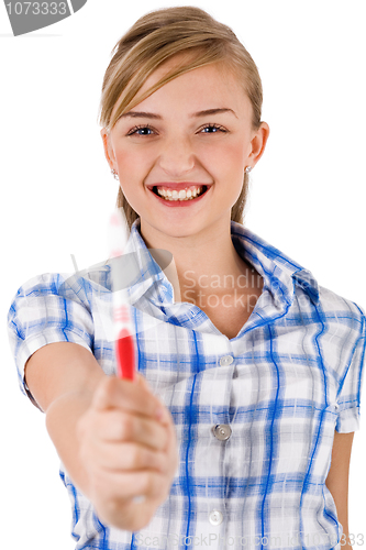 Image of Young women showing toothbrush
