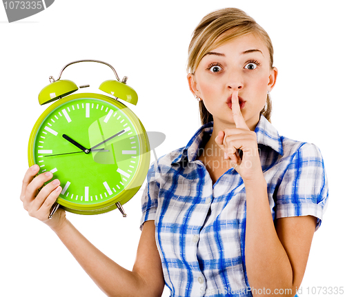 Image of Girl with the clock asking us to maintain silence