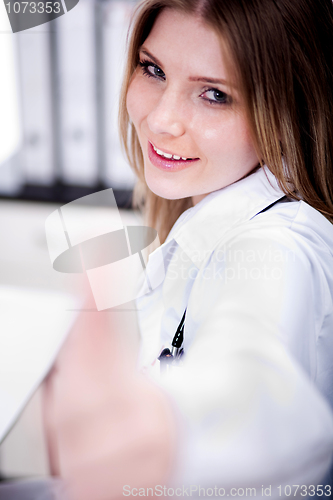 Image of Female Doctor showing thumbs up sign