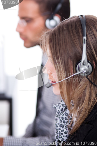 Image of customer executives with headphone