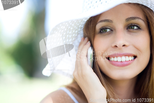 Image of Beautiful women using mobile phone