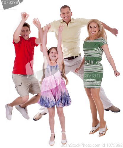Image of Cheerful family jumping to the air and having fun
