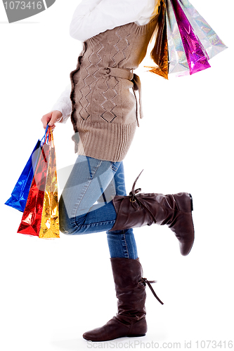 Image of lady standing with shopping bags