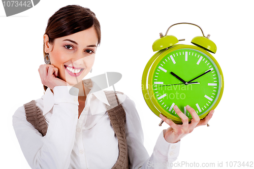 Image of lady holding alarm clock