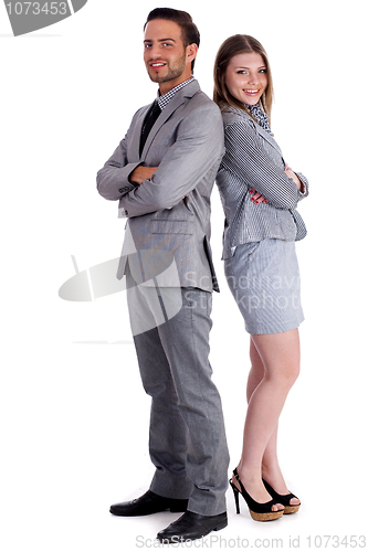 Image of Young business collegues standing back to back