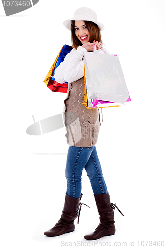 Image of lady posing with shopping bags