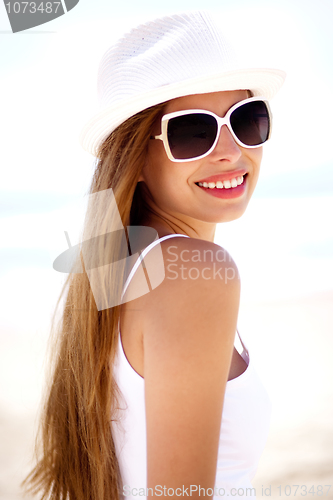 Image of Closeup portrait of young smiling woman