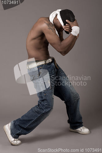 Image of Young teenager performing dance movements