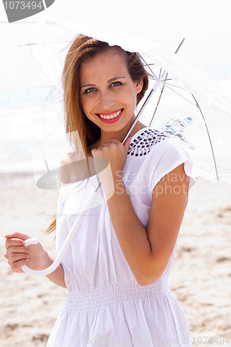 Image of Caucasian women with umbrella