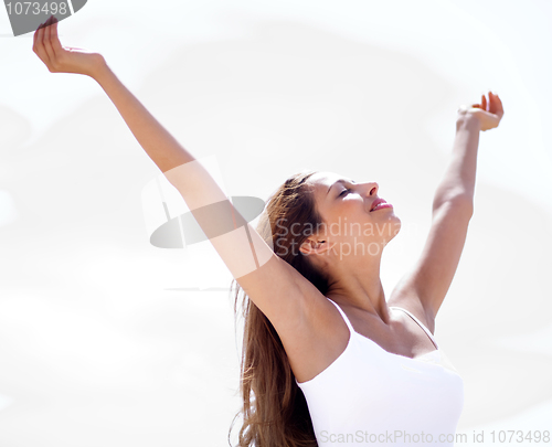 Image of Attractive young female at the beach