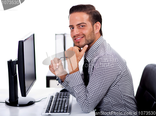 Image of Young business man at the office