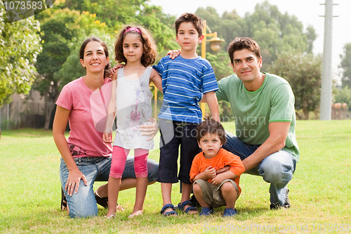 Image of Family posing to the camera