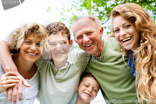 Image of Grandparents having good time with grandchildren