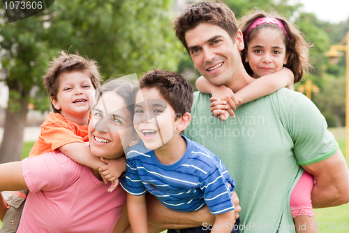 Image of Kids enjoying piggyback ride